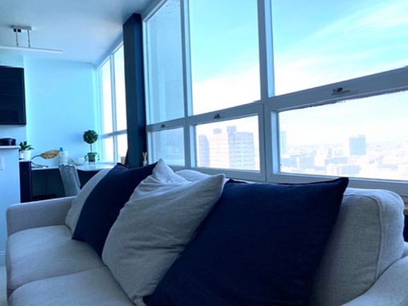 North Wall of Windows provide a lot of light during day and beautiful views at night.