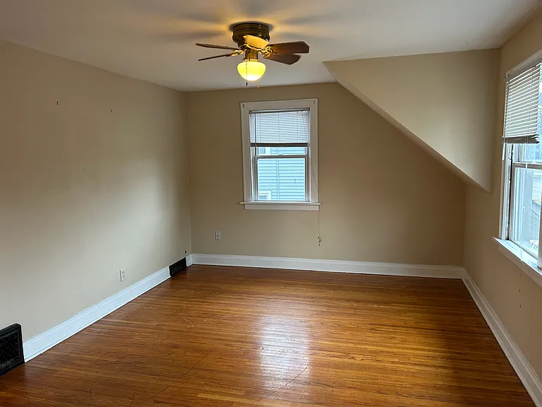 Primary bedroom. Fits king size bed.