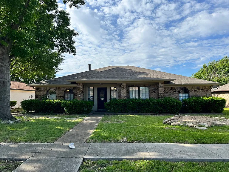 Fabulous four-bedroom home with NO CARPET on a quiet cul-de-sac street. In a wonderful neighborhood within walking distance to a park.