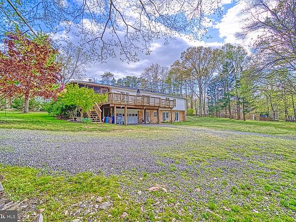 Plenty of parking plus 2-car garage in rear