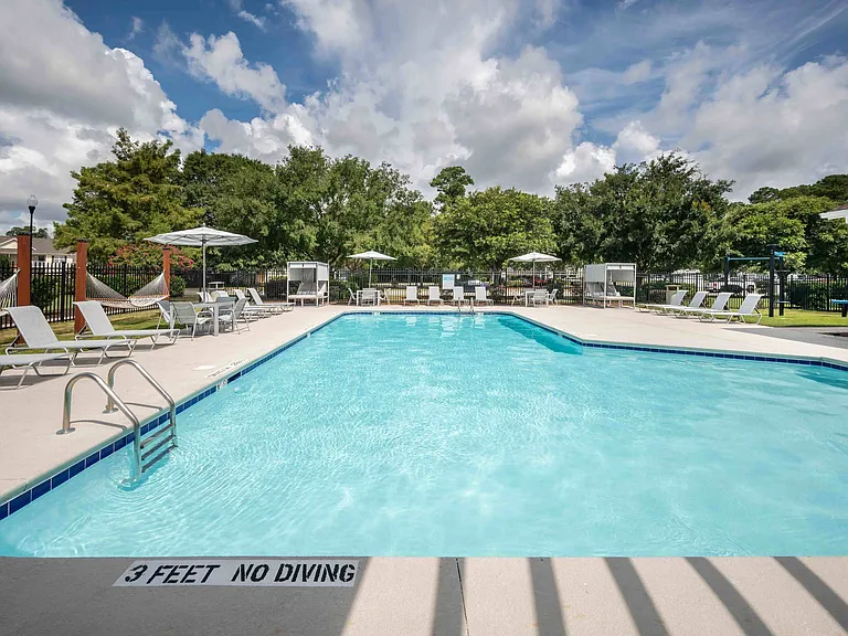 Sparkling Swimming Pool with a Sun Deck