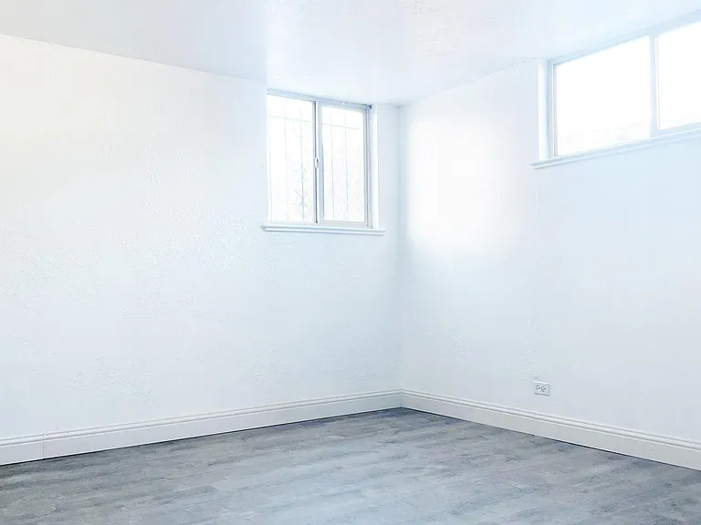 Spacious bedroom with LVP flooring