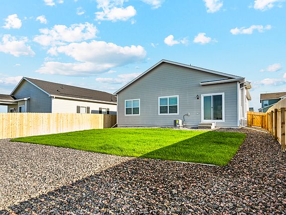 The back yard of the Chatfield is fully fenced-in.
