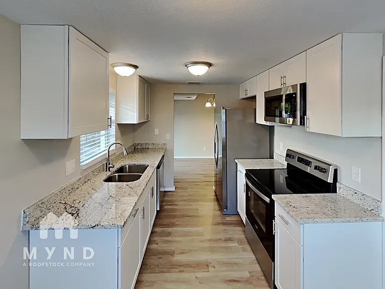7606 Woodland Oaks Ct — Photo 6