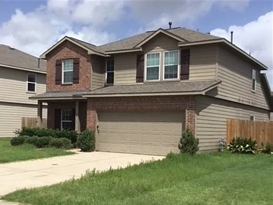 10719 Woodwind Shadows Dr — Photo 1