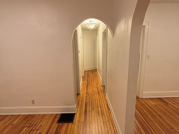 Hallway with living to the left and dining to the right