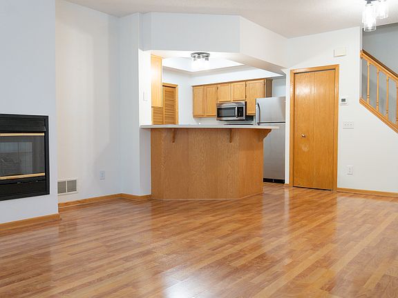 Spacious open floor plan with family and kitchen. Main floor half bath.