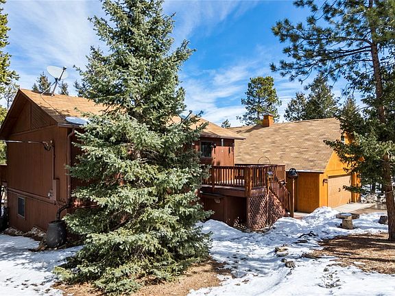 A terrific mountain home, 3 bedrooms, 2 baths, 2-car garage with workshop and finished space above, in a beautiful secluded setting