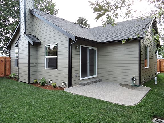 Rear of home with patio