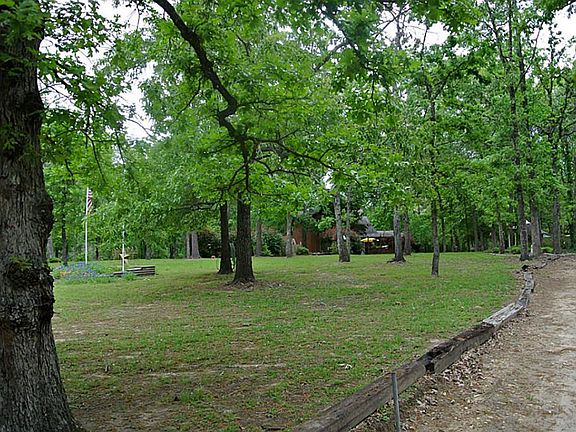 PROPERTY HAS BEEN WELL MAINTAINED. HIGHEST LOT IN WOOD CREEK SUBDIVISION