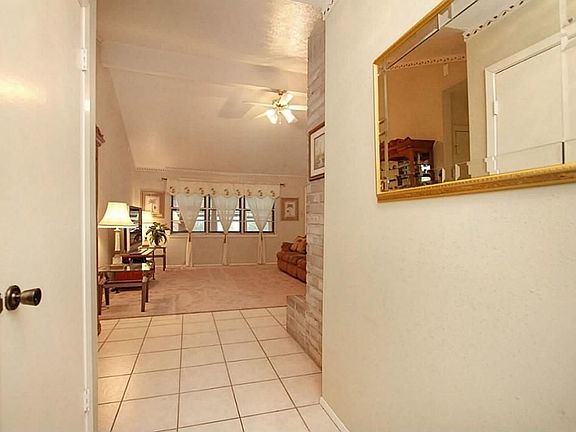 Entry With Tile Floors*Neutral Decor*Lots of Natural Light.