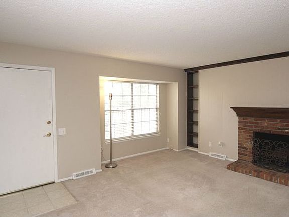 Inviting Family Room w/ Fireplace & Built-ins