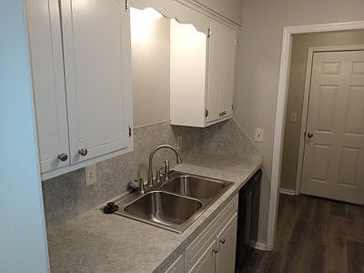 Kitchen with dishwasher, disposal and stove/range