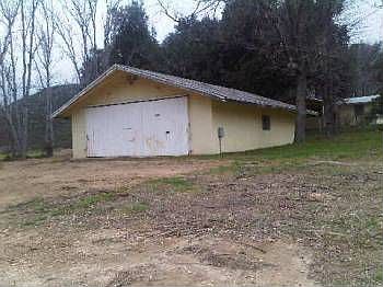 1200 sq. ft. garage/shop has 220 and attic