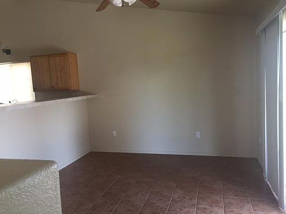 Breakfast nook looking backyard porch/lawn