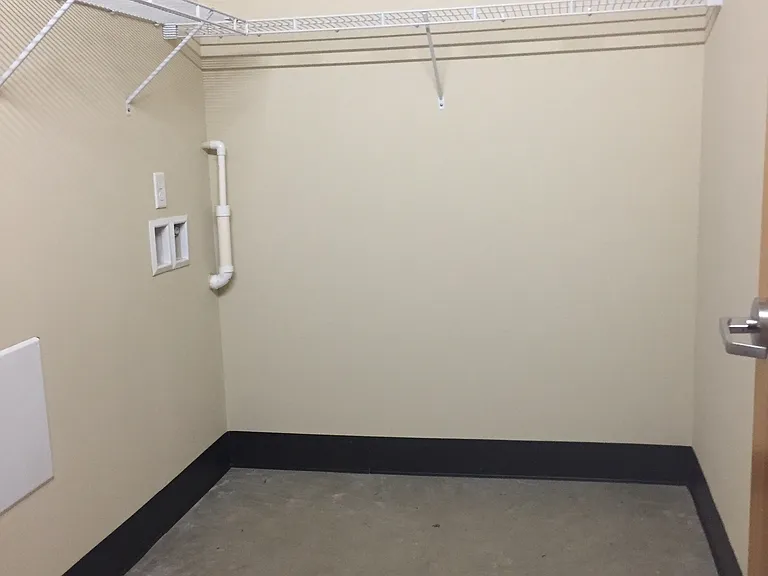 In-apartment storage closet with washer/dryer hookup.