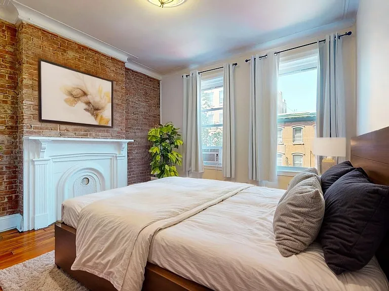 Bedroom 1 (virtually staged to show you multiple furniture layout options)