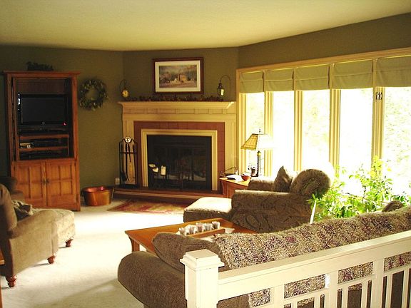 Welcoming living room with natural fireplace