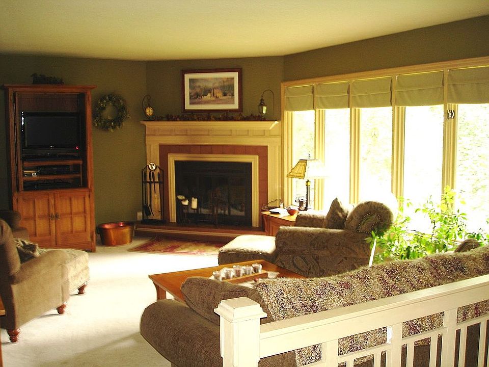 Welcoming living room with natural fireplace