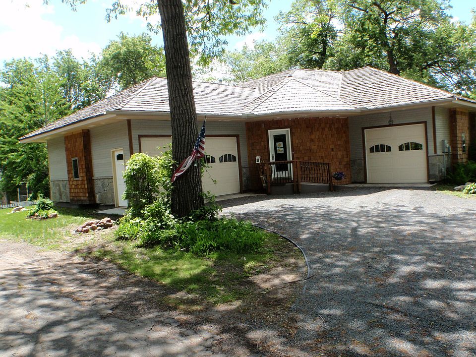 Entry view-two heated garages, ramp to front entry