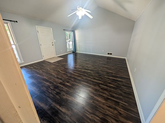 View of living room from the primary bedroom