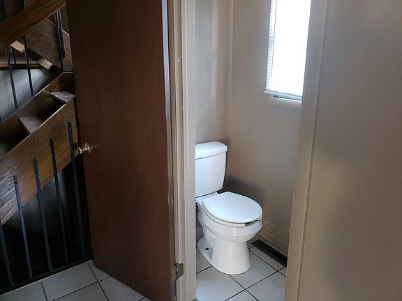 Entry-way bathroom.