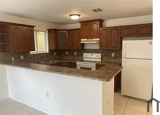 7012 NW 6th Ct — Photo 1