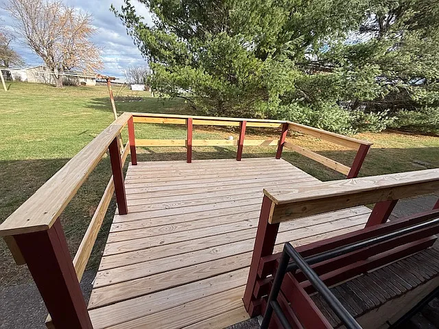 Back door leads out to new deck. Building sits on 2 acres of land.