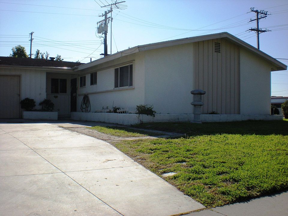 Front of the home showing the extra long driveway