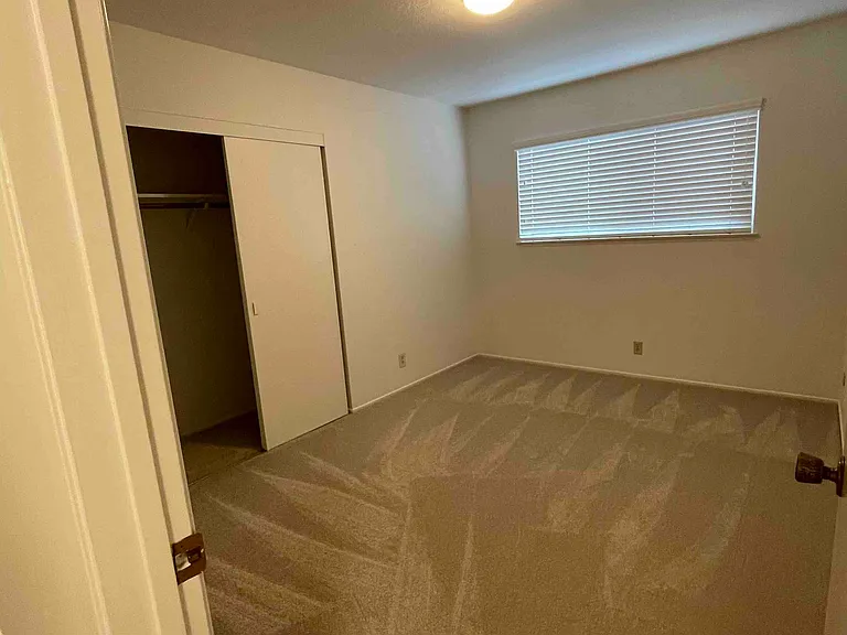 First bedroom with new carpet