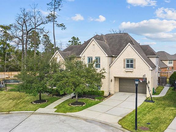 Welcome Home. 25302 E Titan Springs Dr. is nestled on a quiet, idyllic cul-de-sac street. Front features include 3 car garage with double-wide driveway.