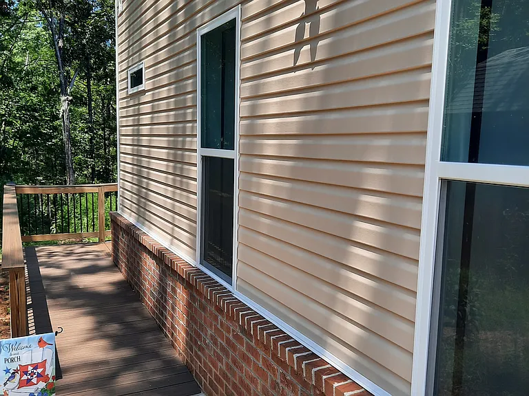 Entrance ramp from parking space leading to front door.