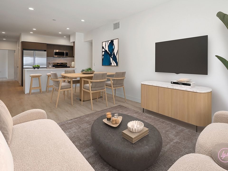 Kitchen, Dining, and Living Room with Recessed lighting and Vinyl Flooring - Eagle Floor Plan