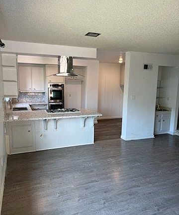 kitchen with new double oven and microwave
