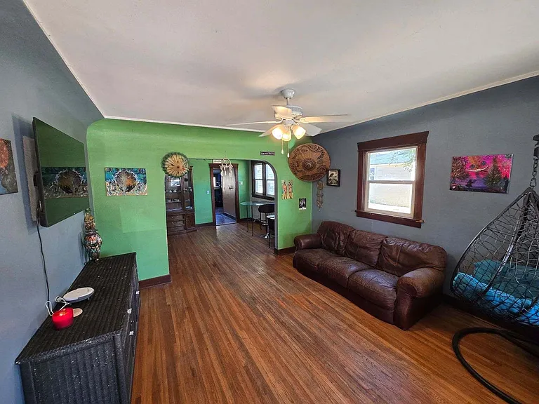Great big living room with open floorplan into the generous formal dining area. Lots of great light and plenty of fresh air.