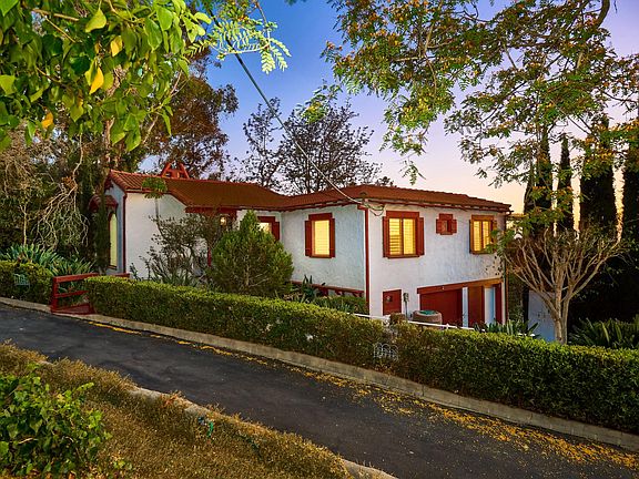 View of house from street at twilight