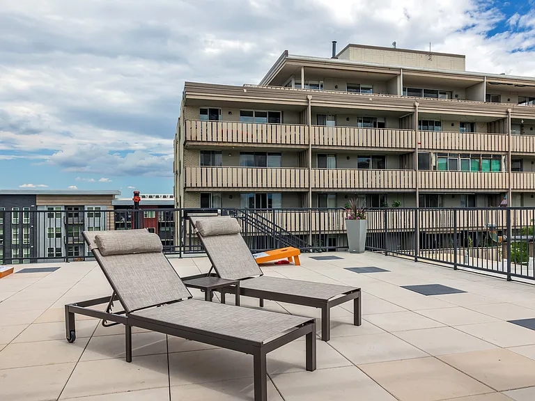 Rooftop Lounging Area + Cornhole