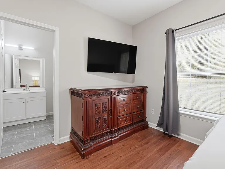 Wall-mounted 55" 4K Roku TV