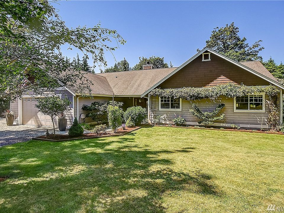 Welcome to this custom built home sitting on over 5 secluded acres of beautiful land in Monroe. 