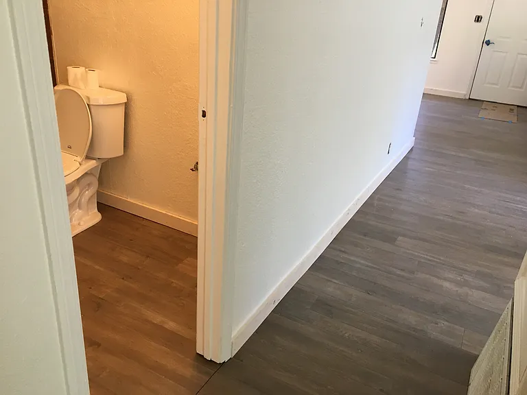 From the bedroom towards the bathroom and south door