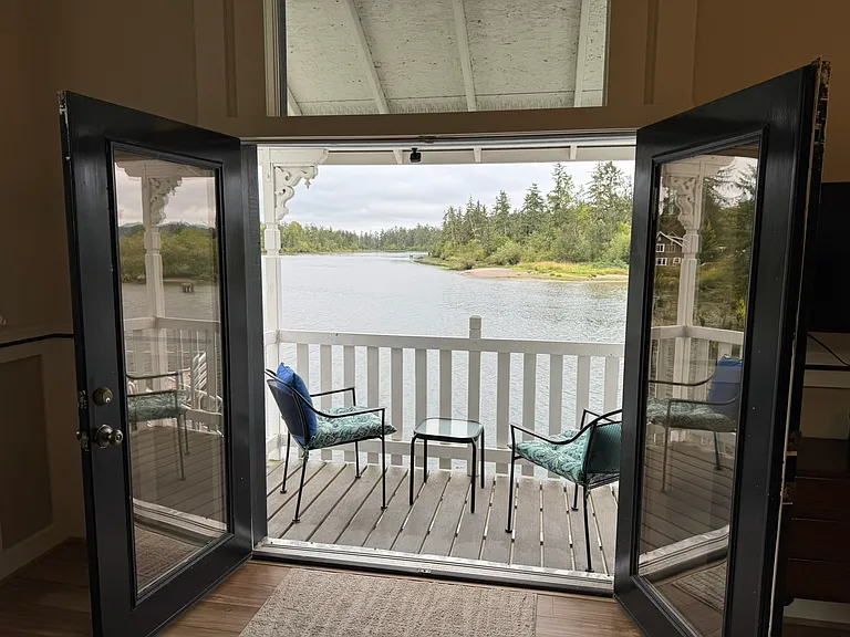 Balcony overlooking Steamboat Slough.