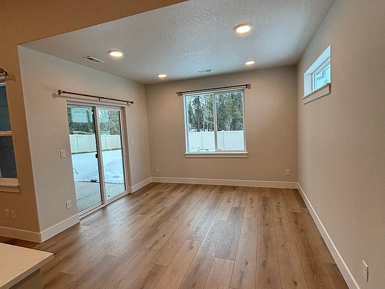 Dining room area with sliding glass door to covered back porch