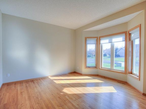 ML Living Room with gleaming hardwood floors.