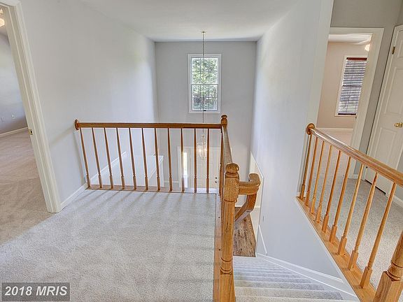 Traditional entry into 2 story foyer flows easily