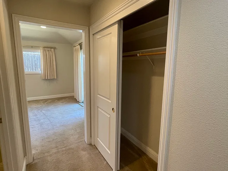 Primary Suite- Soaring vaulted ceilings supporting a dramatic matrix of recessed LED lighting.