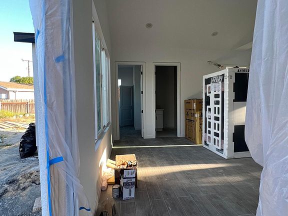 Entry way at front door- FENCE, LANDSCAPING & INTERIOR FINISHES NOT COMPLETE, CURRENTLY BEING FINISHED.