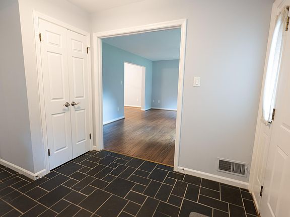 Entrance foyer to living and sitting rooms.