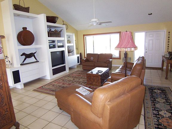 open living area with built in entertainment center