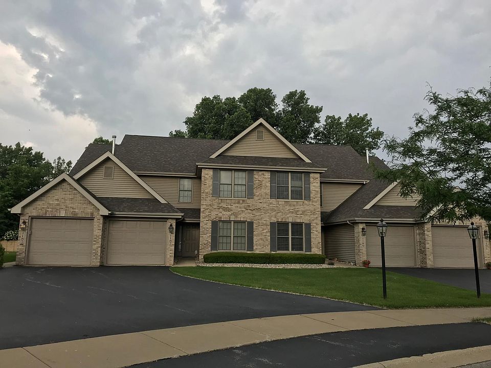 Far left garage and top left windows