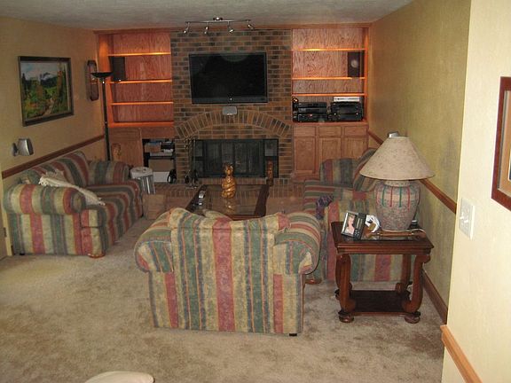 Family room with built in oak cabinets